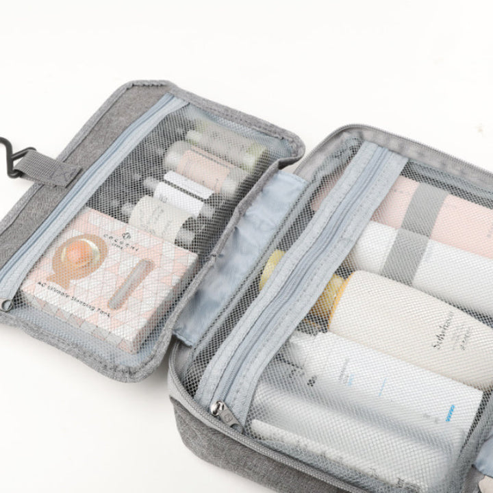 Travelique Reisekosmetikkveske | Kompakt og Vanntett | Med 4 Rom og 360° Krok | For Kvinner og Menn