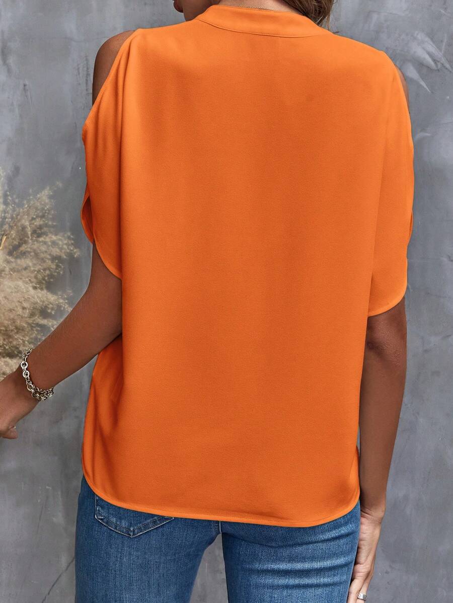 V-neck blouse with short, flared sleeves