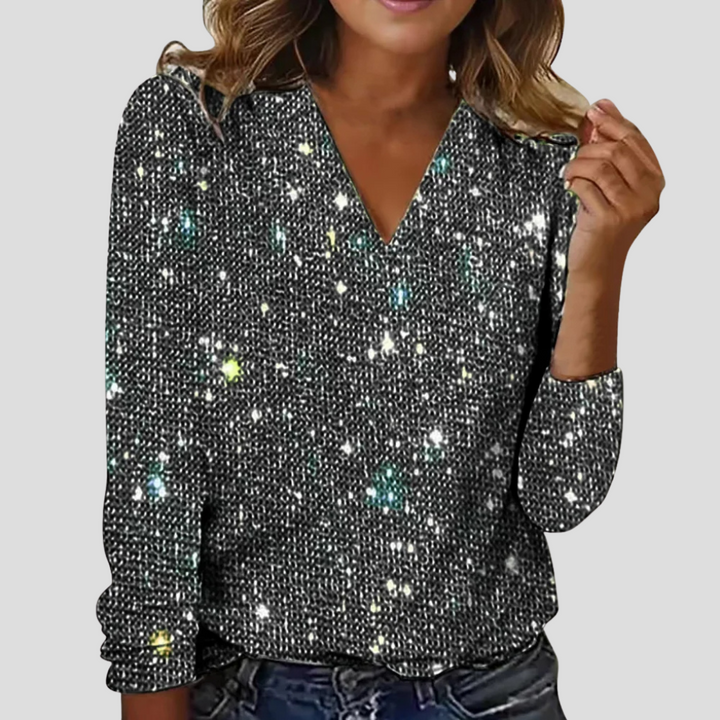 Elegant glitterbluse med V-hals og lange ermer
