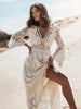 Bohemian maxi dress with lace and elegant, flared sleeves