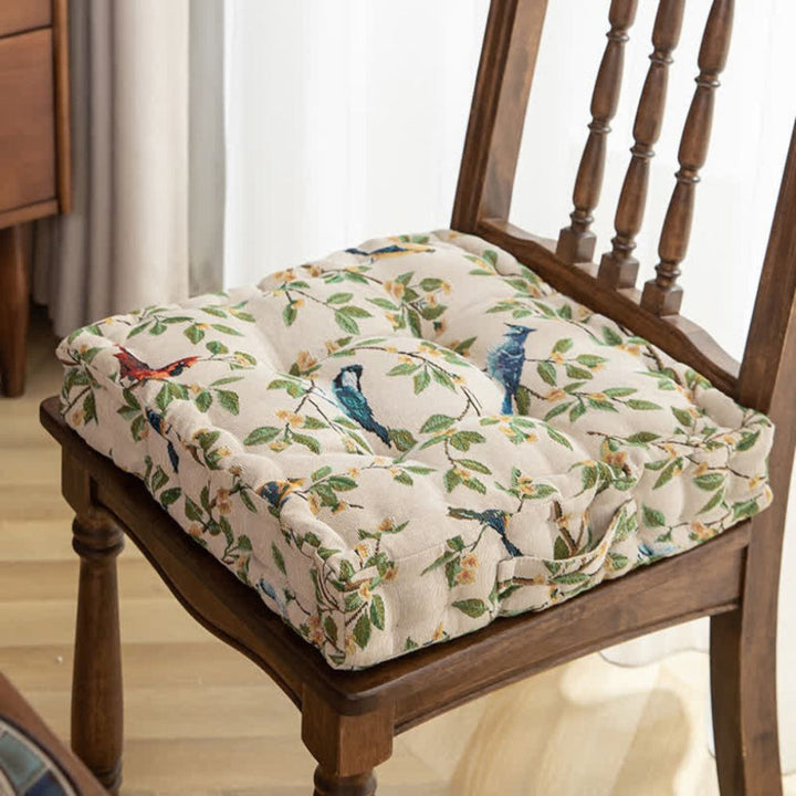 Thick padded seat cushion with strap for dining room or terrace chairs