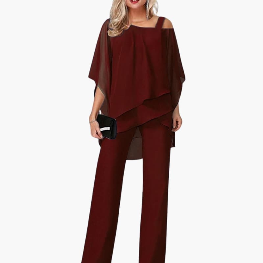 Kvinners jumpsuit med kald skulder og brede bukser