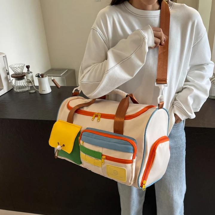 Lett reiseveske med fargeblokker - FlexaBag