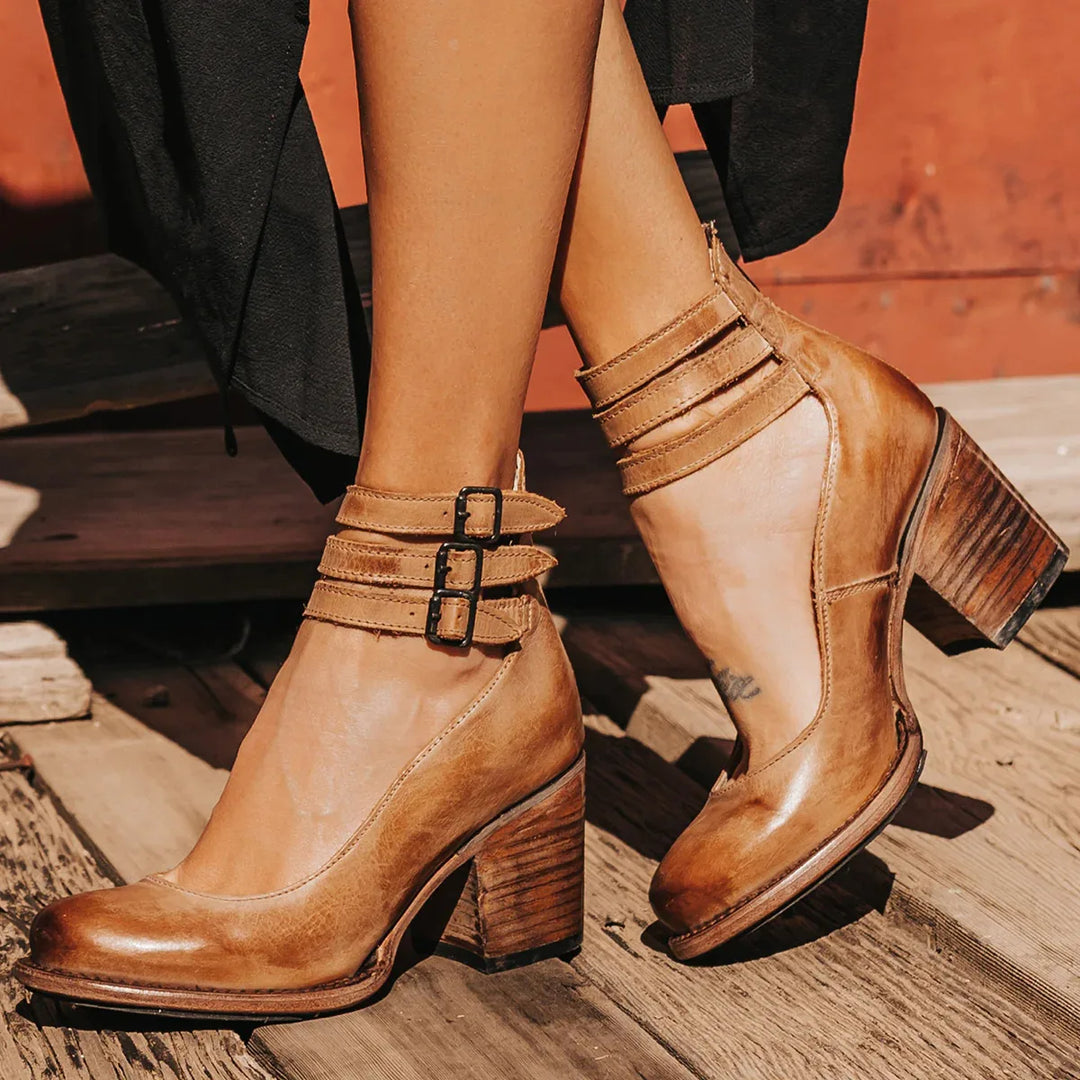 Vintage-inspired pumps with ankle strap and chunky heel