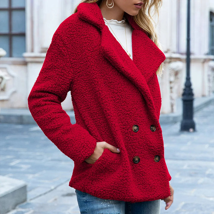Mid-length coat with double-breasted buttons Elegant warmth with a timeless silhouette