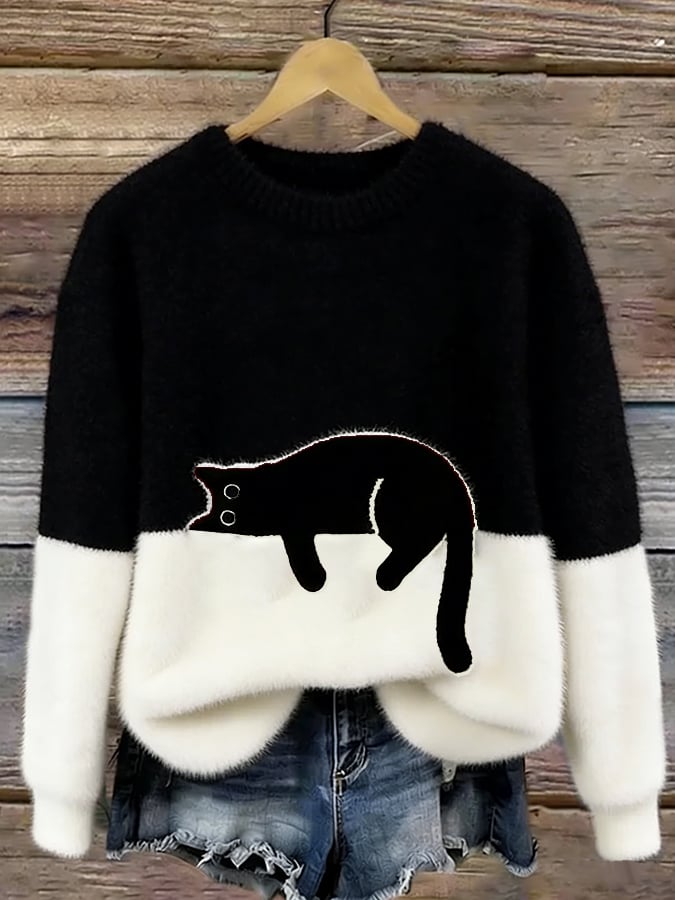 Oversized genser med kattetrykk