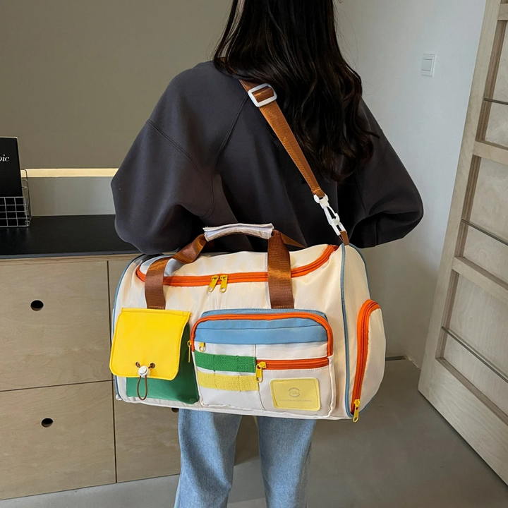 Lett reiseveske med fargeblokker - FlexaBag