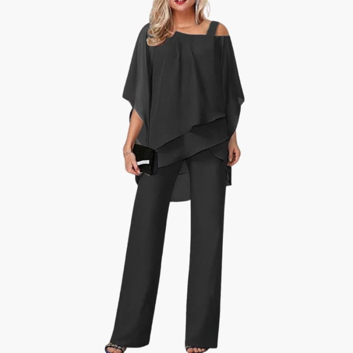 Kvinners jumpsuit med kald skulder og brede bukser