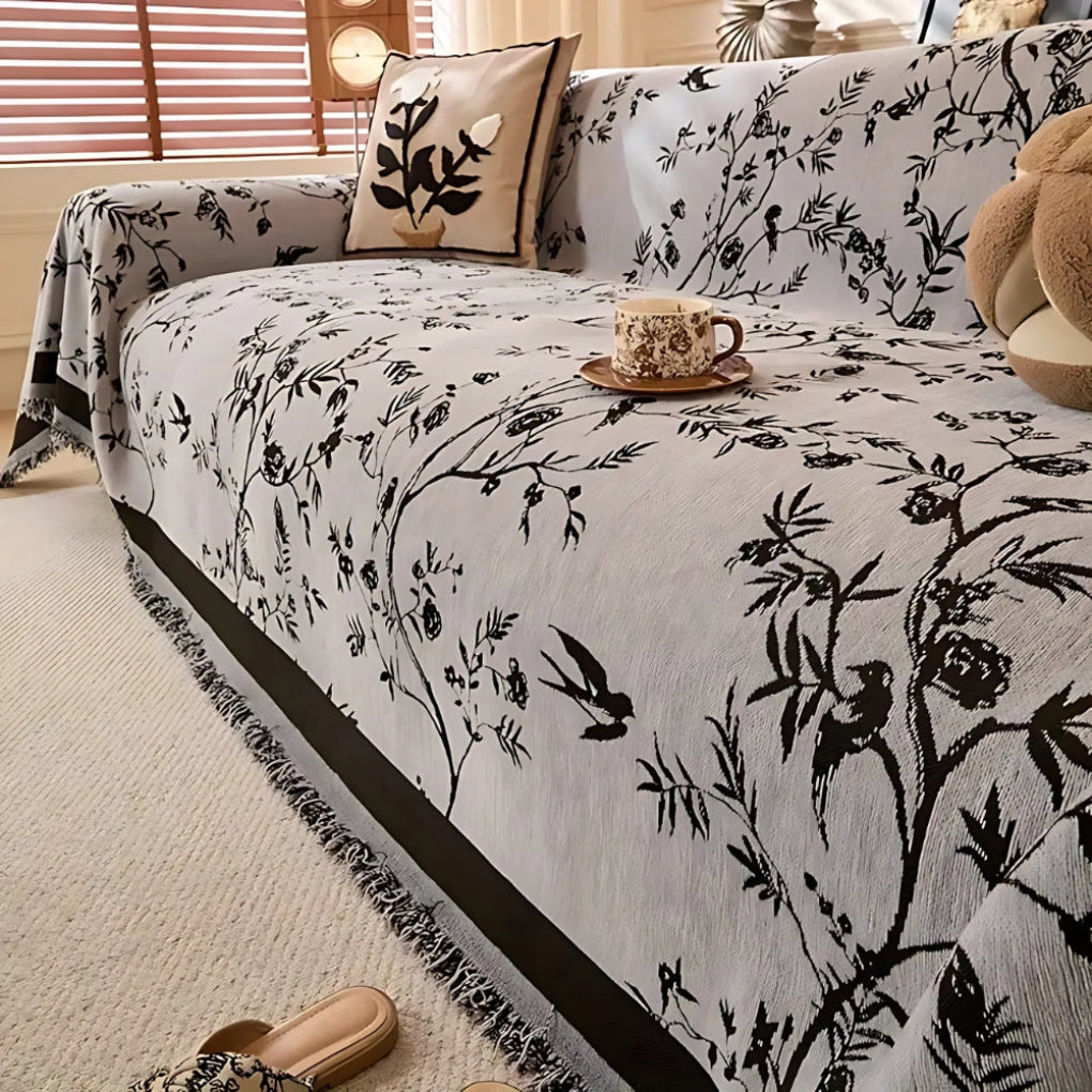 Elegant blomstermønstret pledd med frynser