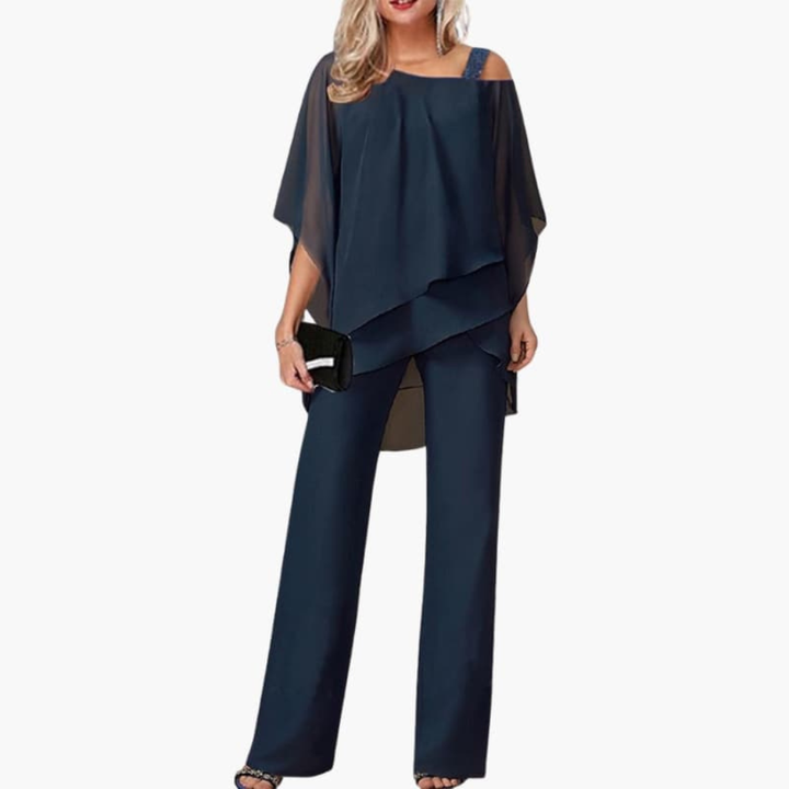Kvinners jumpsuit med kald skulder og brede bukser