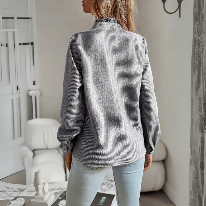 Elegant long-sleeved blouse