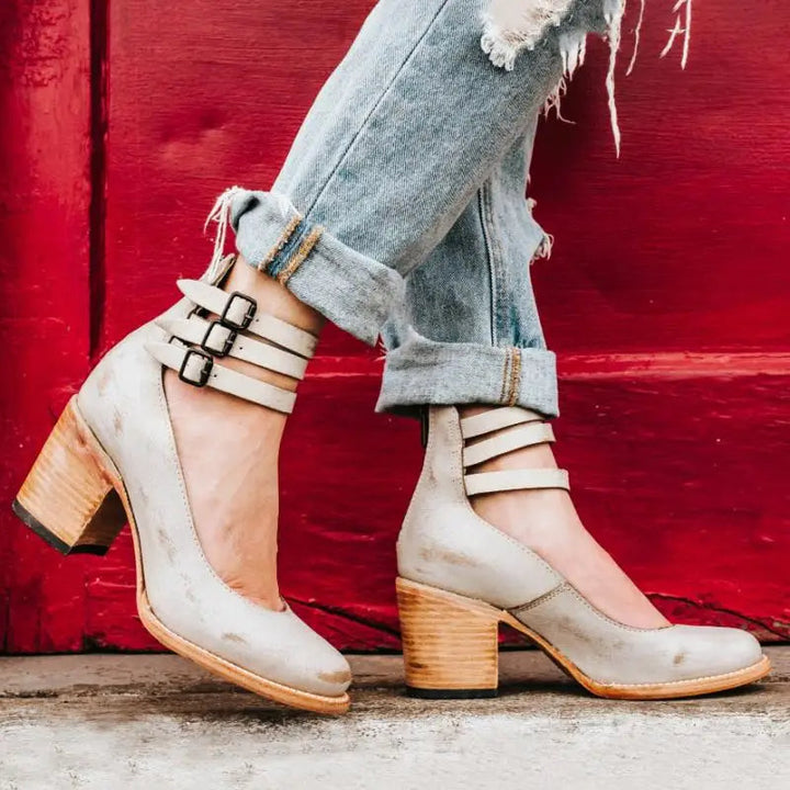 Vintage-inspired pumps with ankle strap and chunky heel