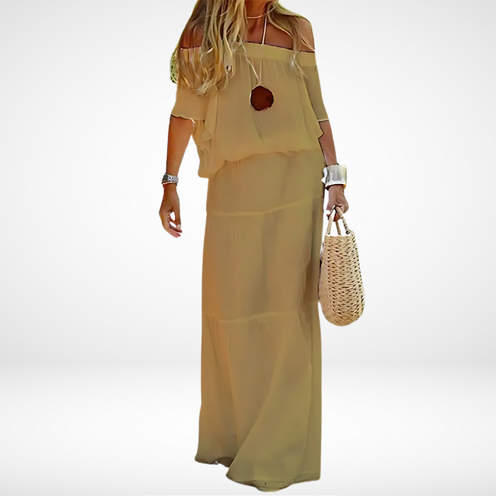 Elegant white maxi beach dress with off-shoulder fit