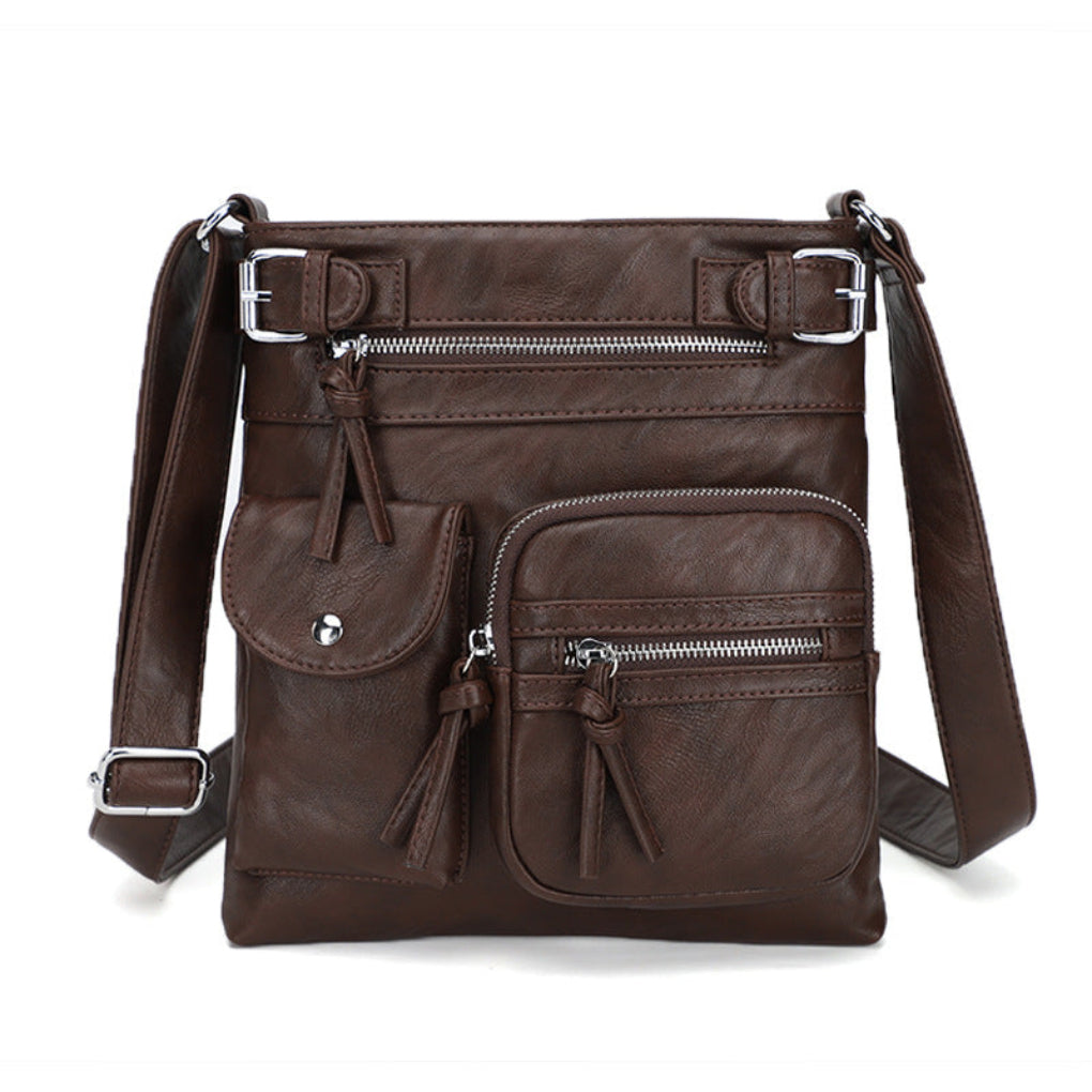 Ladies' leather shoulder bag with multiple pockets