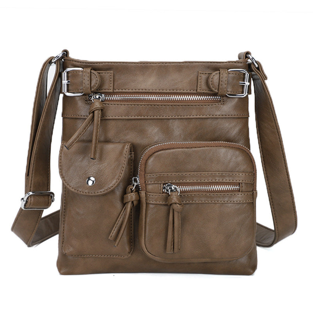 Ladies' leather shoulder bag with multiple pockets