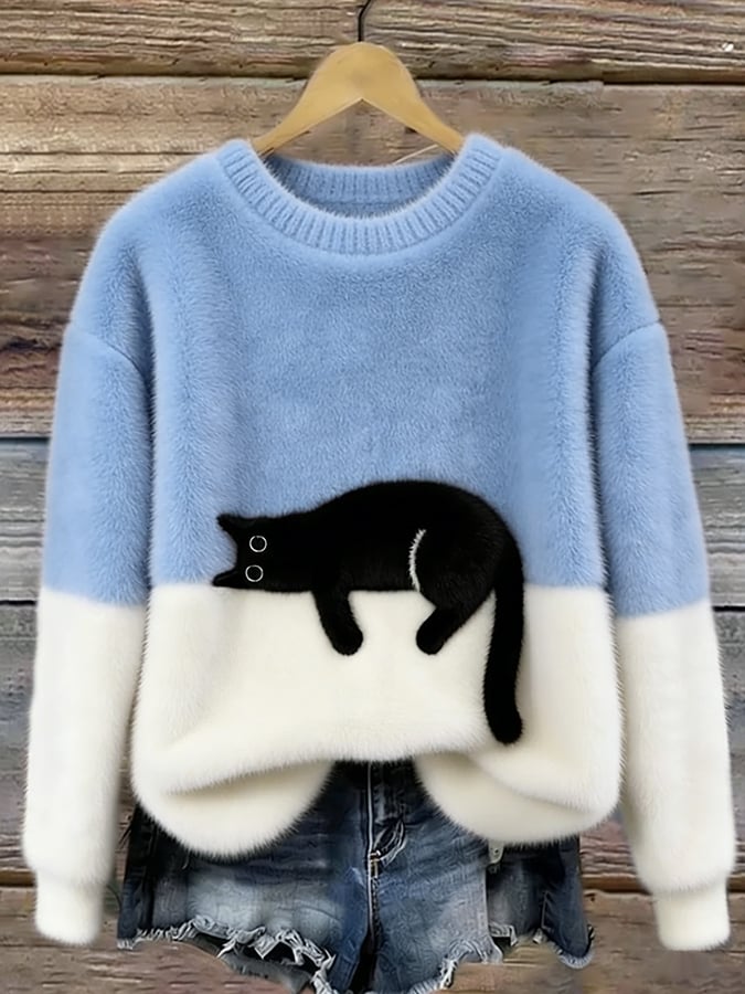 Oversized genser med kattetrykk