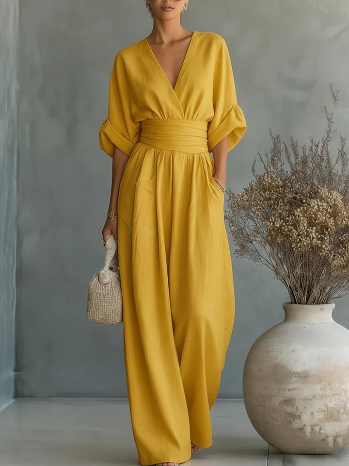 Elegant jumpsuit for damer med vide bukseben, V-utringning og flytende snitt