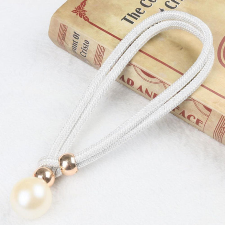Shiny elegant 2-piece set with mother-of-pearl curtain tape