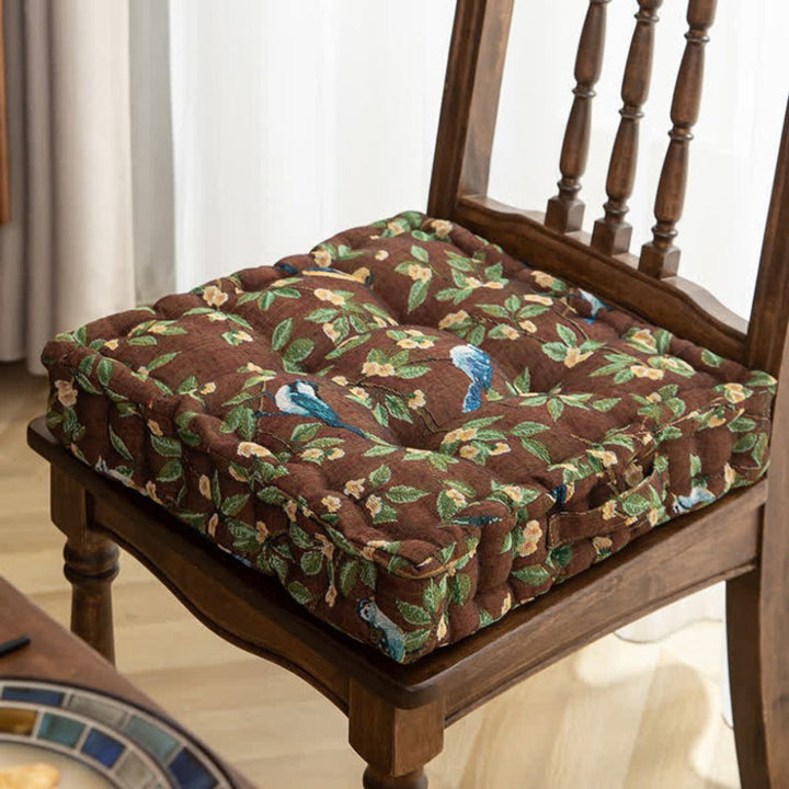 Thick padded seat cushion with strap for dining room or terrace chairs