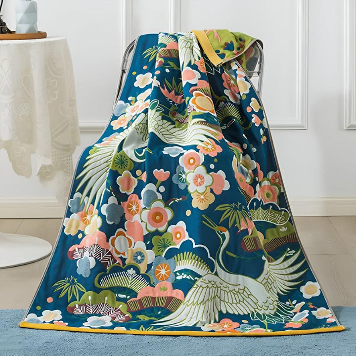 Luxurious bath towel with cranes and flowers