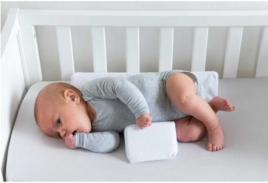 Justerbar sideliggepute for baby