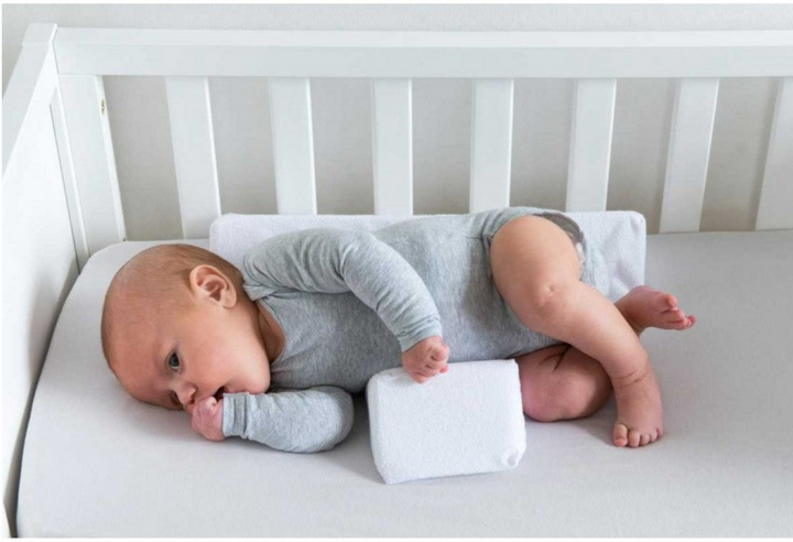 Justerbar sideliggepute for baby