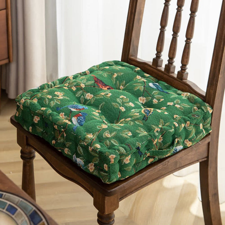 Thick padded seat cushion with strap for dining room or terrace chairs