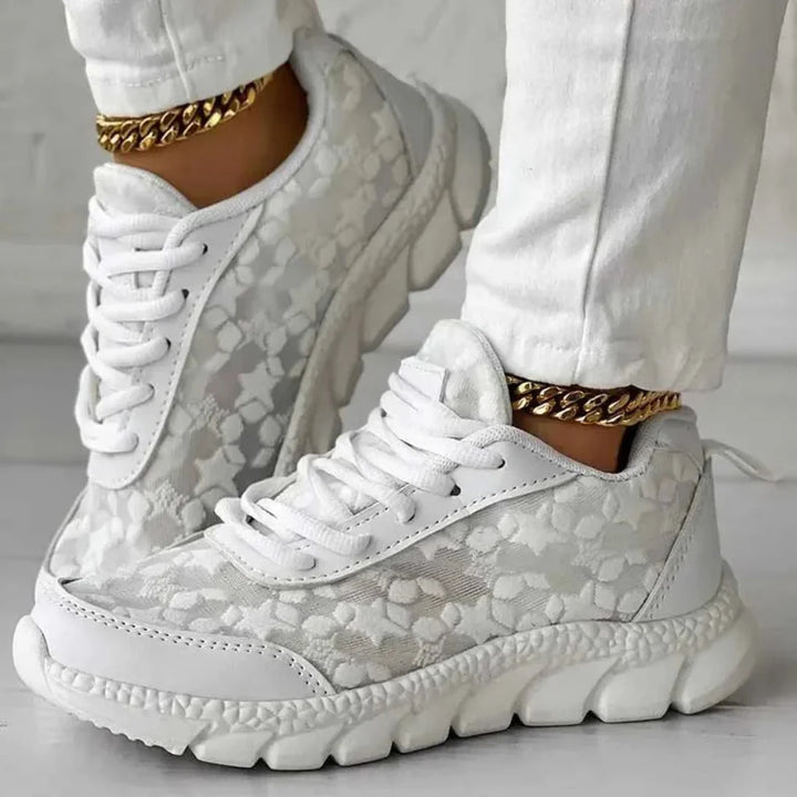 Breathable sneakers with star pattern and lace-up closure for women