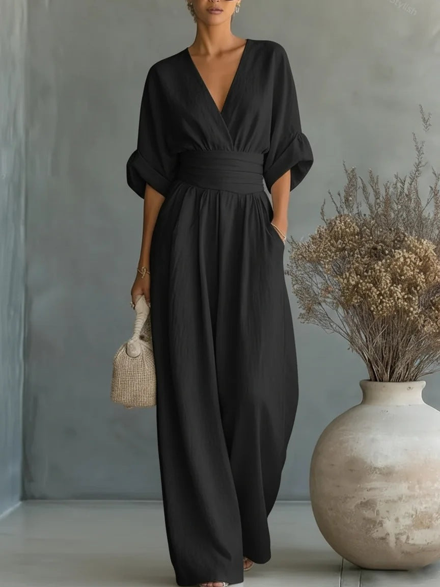 Elegant jumpsuit for damer med vide bukseben, V-utringning og flytende snitt