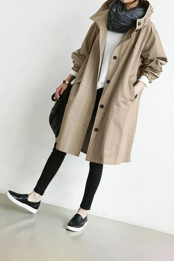 Waterproof, oversized trench coat in mid-length model