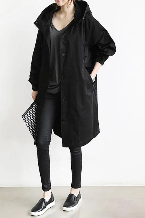 Waterproof, oversized trench coat in mid-length model