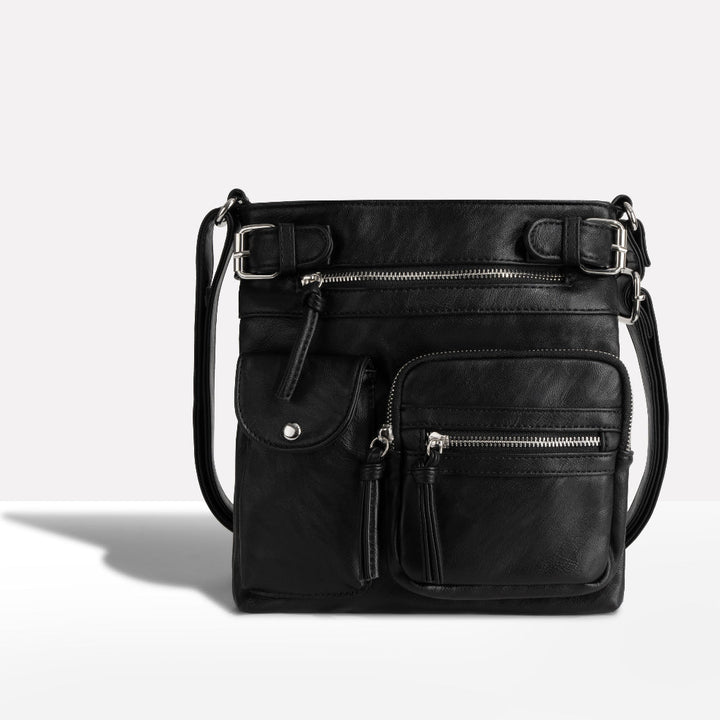 Ladies' leather shoulder bag with multiple pockets