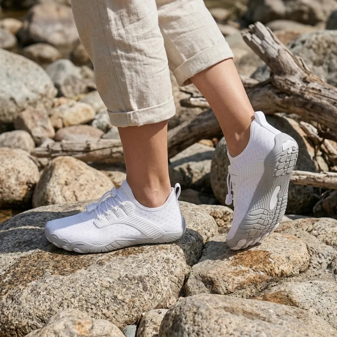 Barfotsneakers til dame med bred tåboks og fleksibel såle