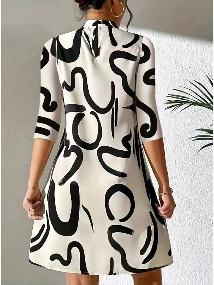 Elegant and Comfortable Dress with Collar and Printed Pattern