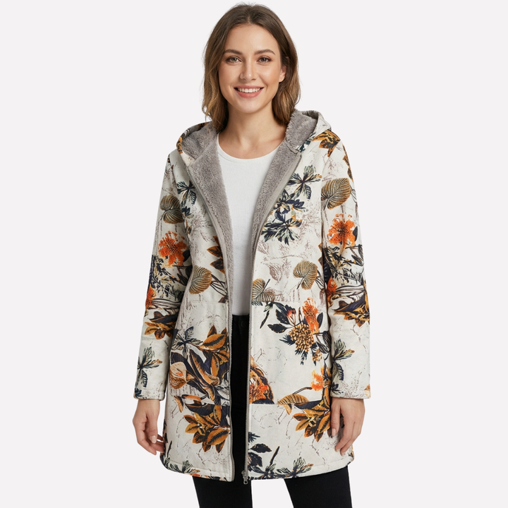 Lang vårjakke for dame med hette og lommer foran