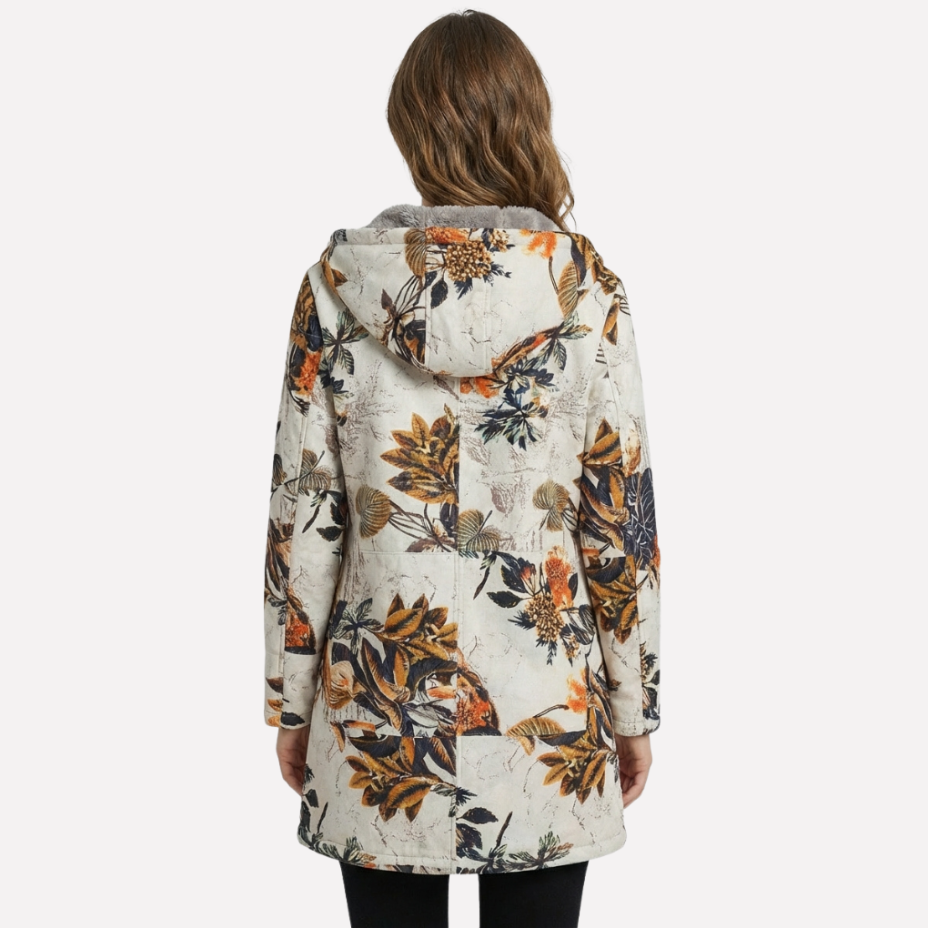 Lang vårjakke for dame med hette og lommer foran