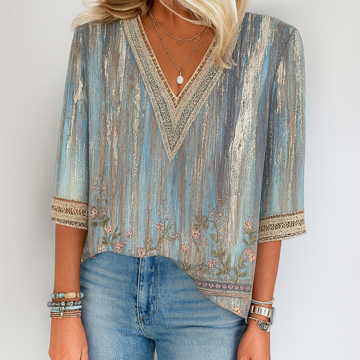 Loose-fitting blouse with V-neck and print
