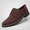 Oxford shoes with brogue details in suede leather