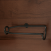 Elegant veggmontert jernvinholder for vinkjennere