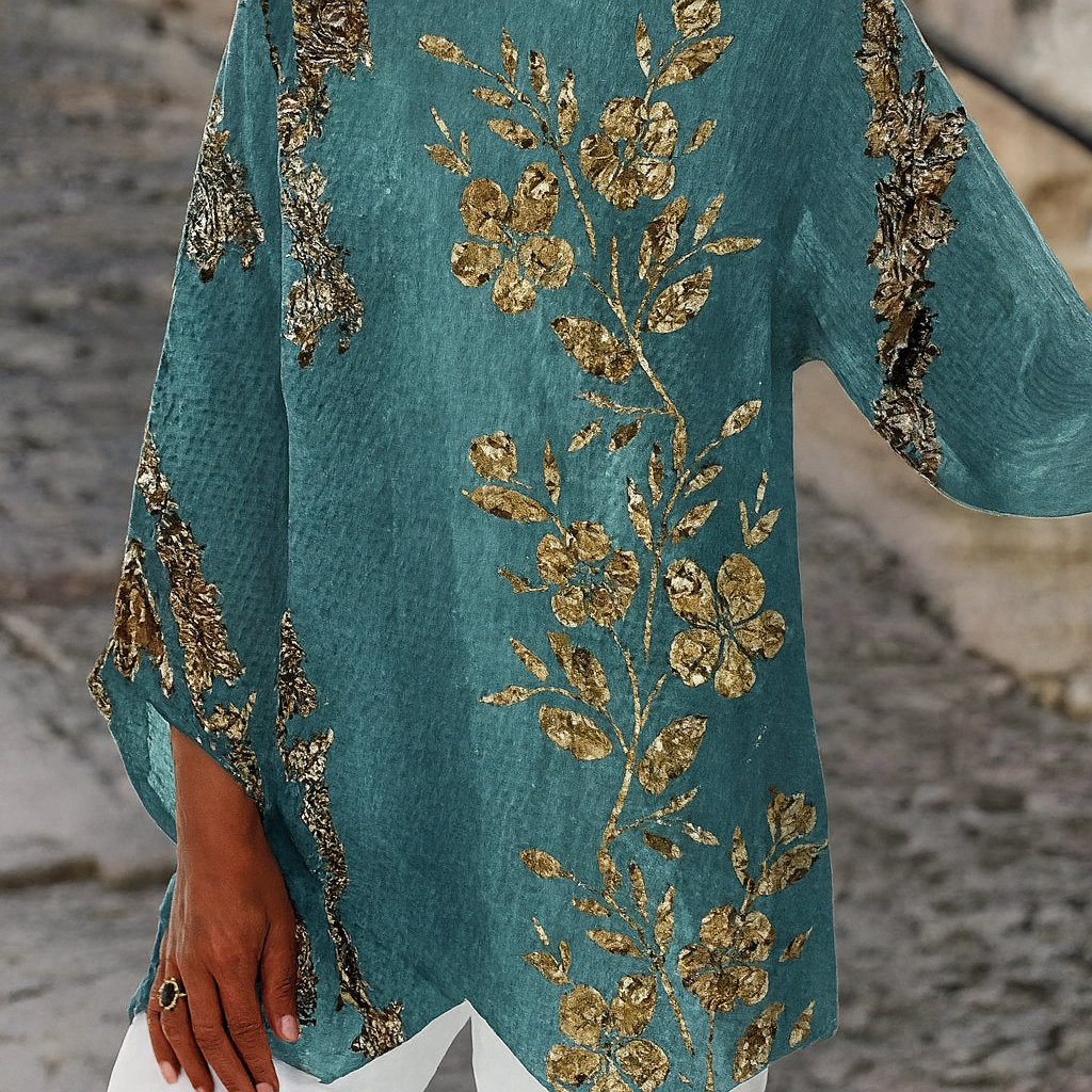 Gyllen bluse med blomstertrykk og lange ermer – Uformell eleganse med feminine detaljer