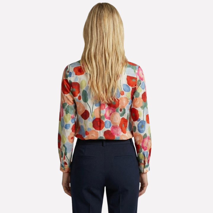 Skjorte med blomstermønster og tegneserietrykk