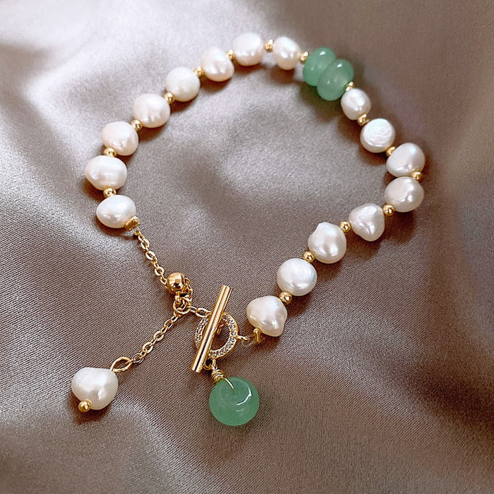 Elegant havperle-eventyrarmbånd – Ariel
