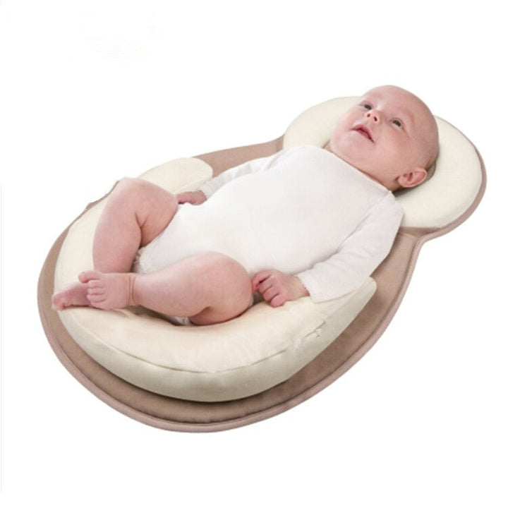Ergonomisk bærbar babyseng med hodestøtte mot flatt hode – Schlafcocon