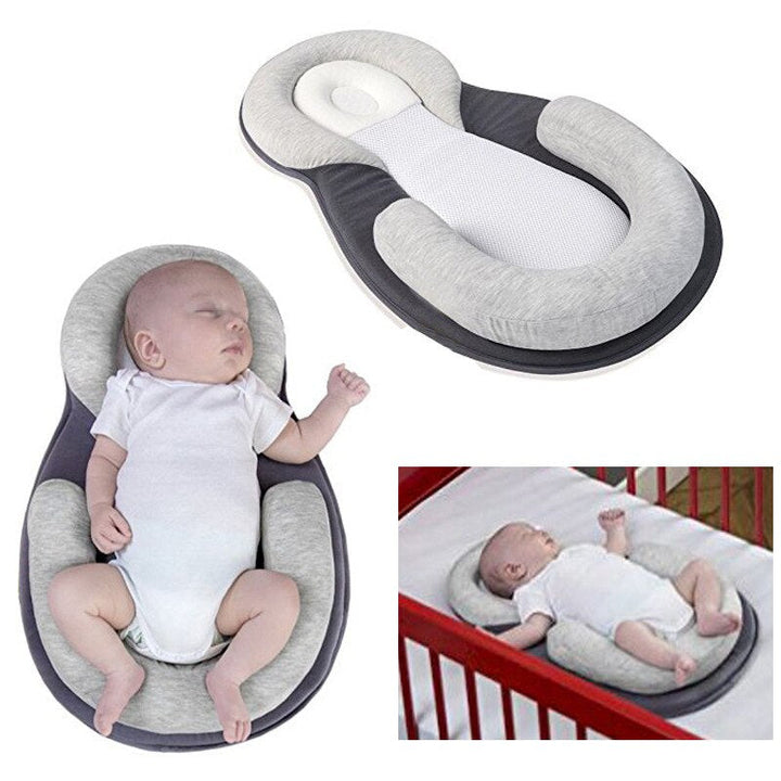 Ergonomisk bærbar babyseng med hodestøtte mot flatt hode – Schlafcocon