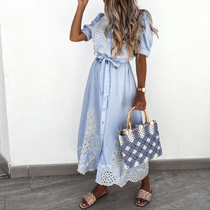 Embroidered blue dress with elegant details