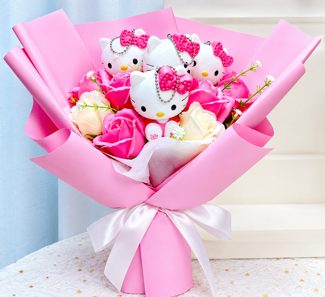 Bukett med fargerike kunstige blomster og Kitty-figurer til gave og pynt