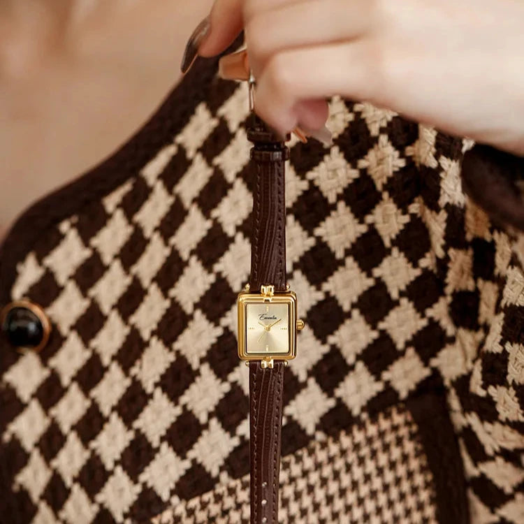 Sienna - elegant kvartsklokke med gullfarget rem
