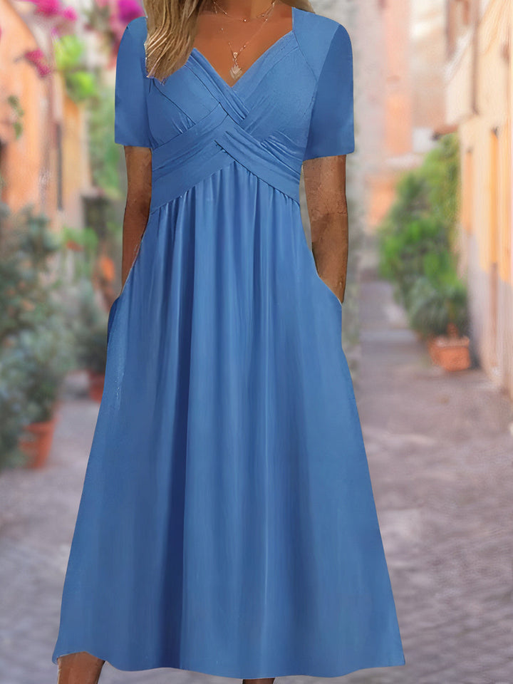 Elegant sommerkjole med V-hals