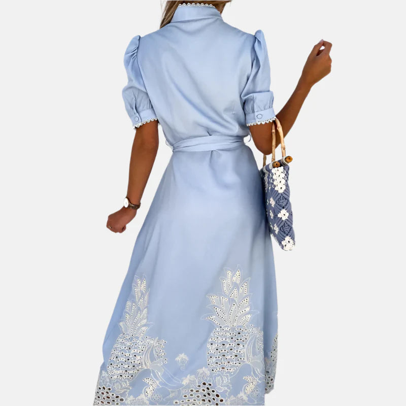 Embroidered blue dress with elegant details
