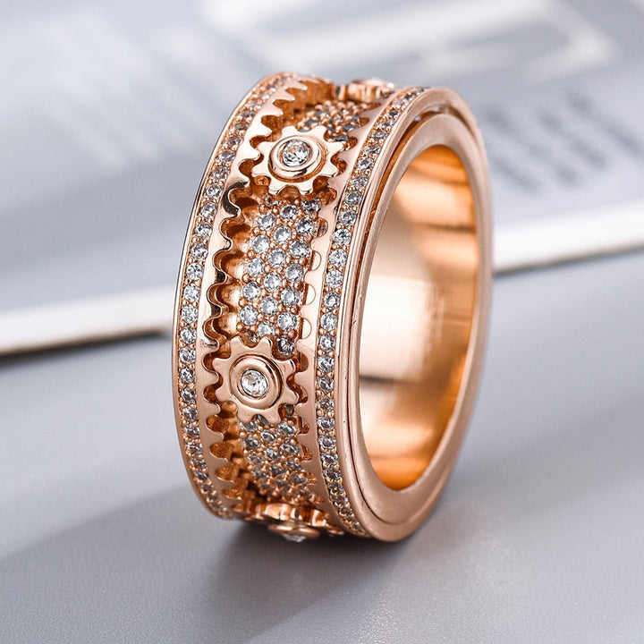Spinnring med roterende design